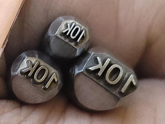 Hallmark Metal Stamp-10k