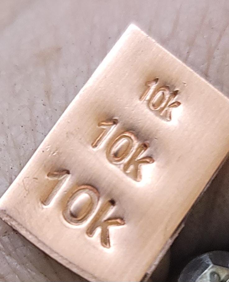 Hallmark Metal Stamp-10k