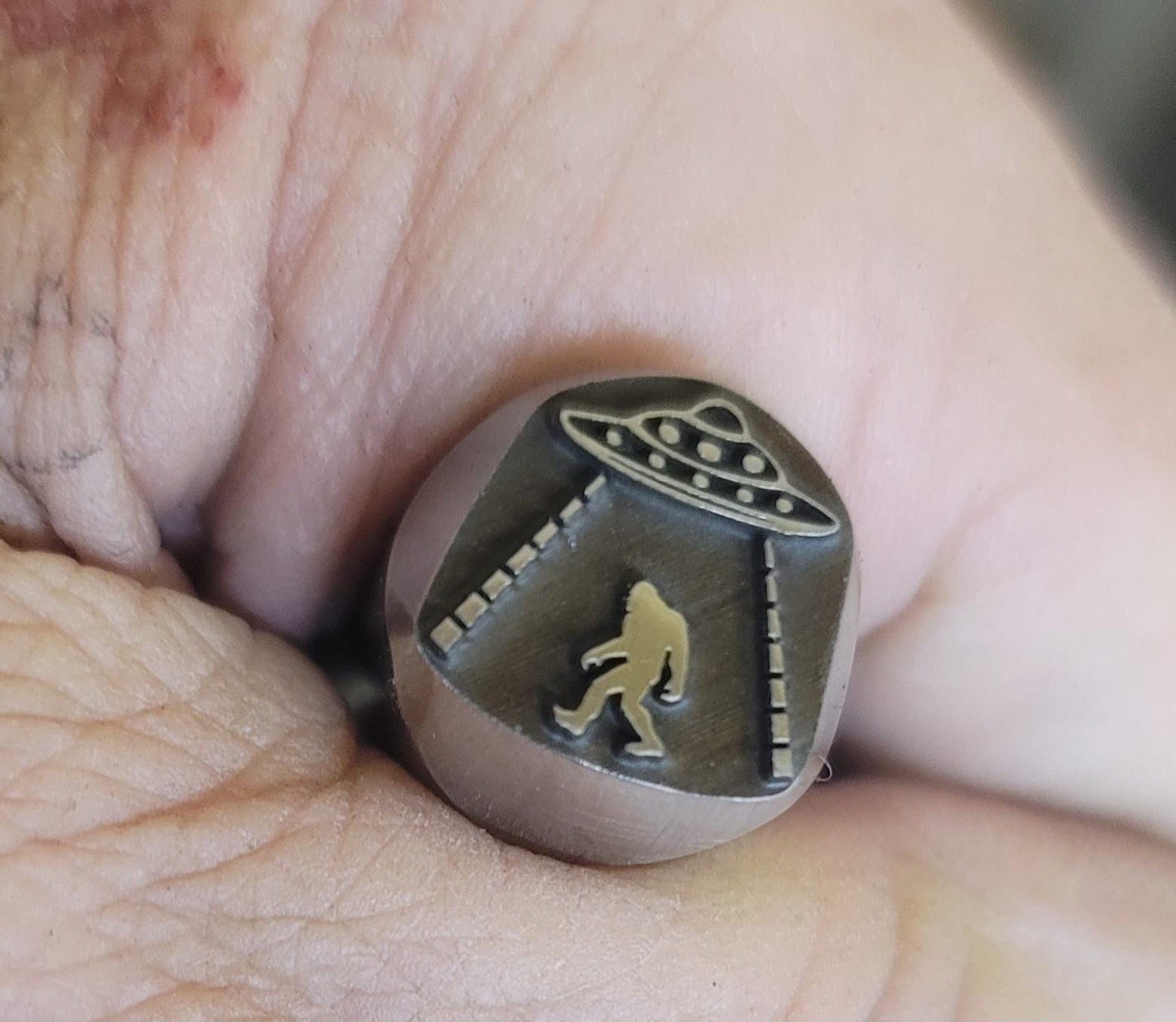 Sasquatch abducted by Aliens - Metal Stamp