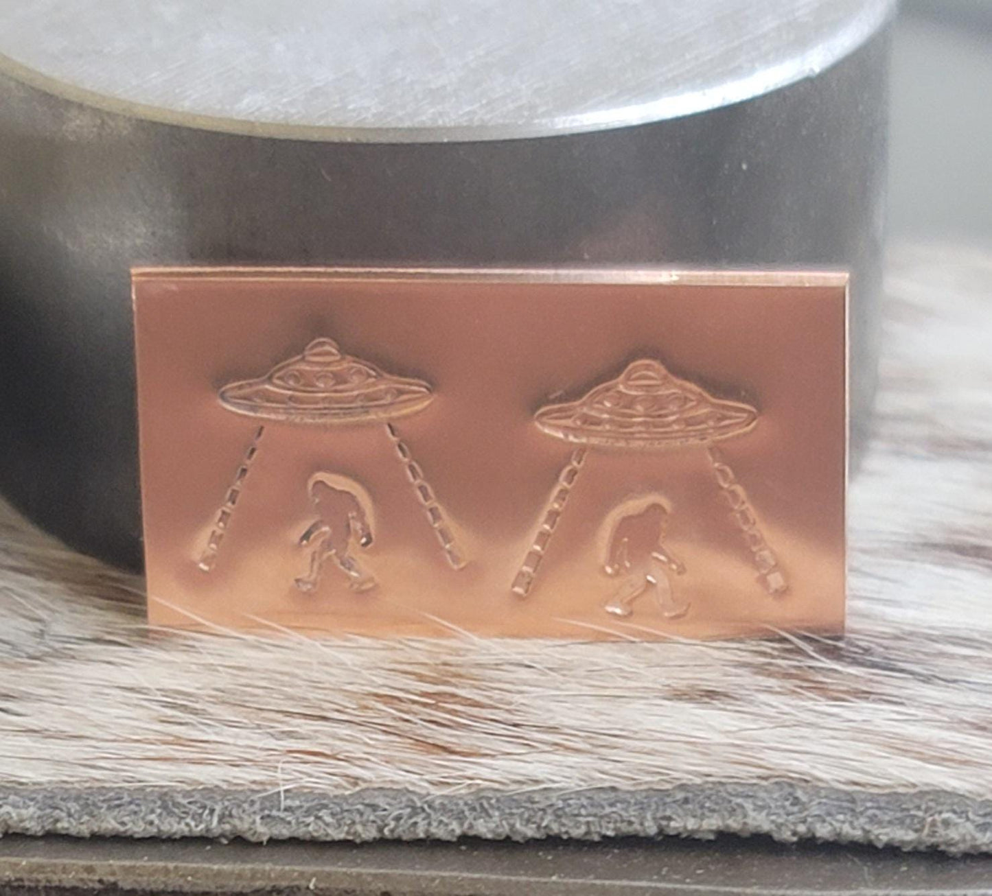 Sasquatch abducted by Aliens - Metal Stamp